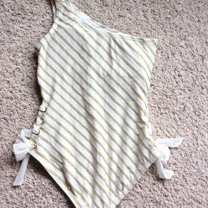 Women’s size 6 swimsuit one piece cream colored with gold strips